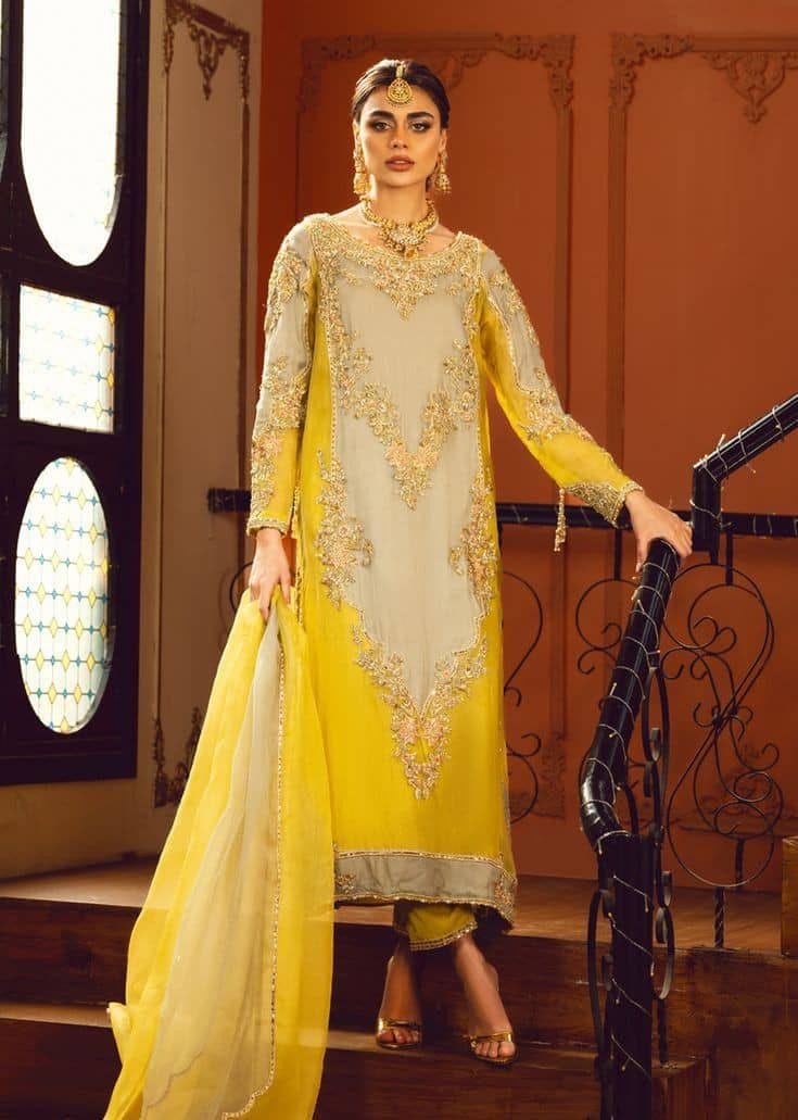 ndulge in unparalleled luxury with our stunning yellow ensemble