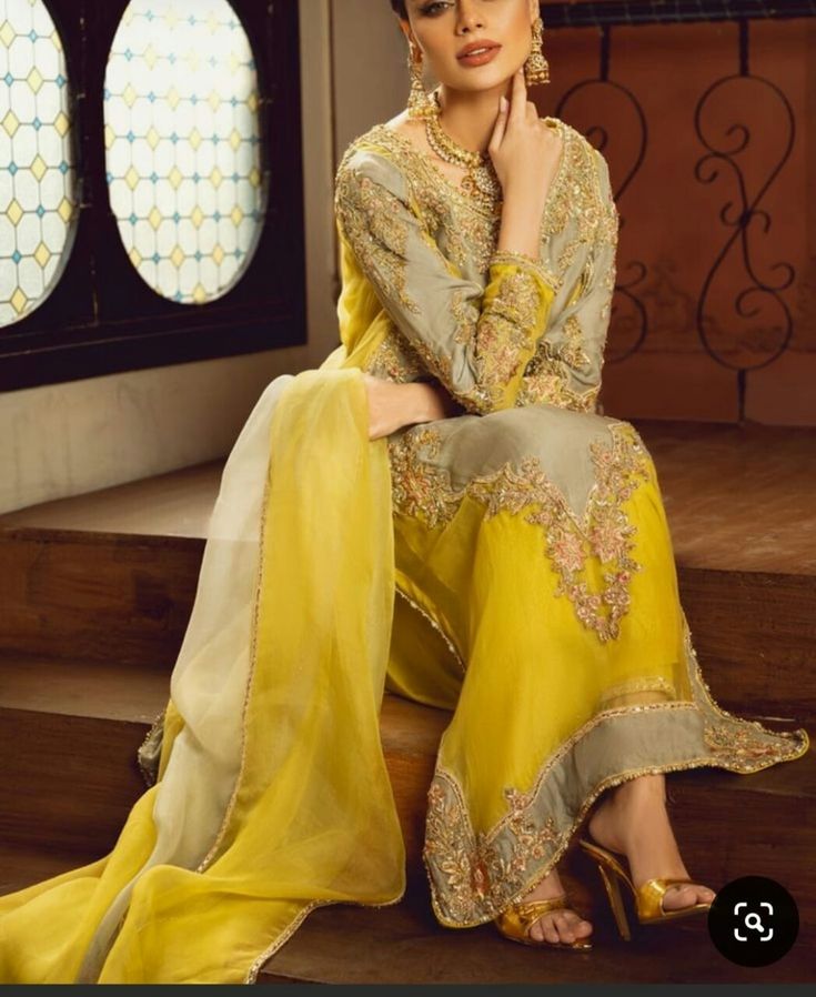 ndulge in unparalleled luxury with our stunning yellow ensemble